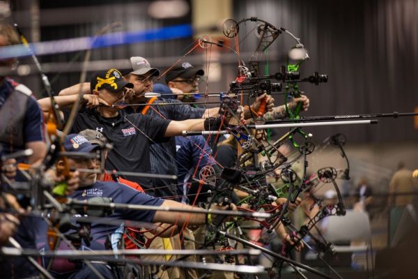 Archer aiming a bow, illustrating value crossbow shooting
